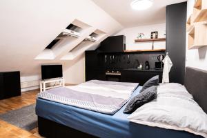 Postelja oz. postelje v sobi nastanitve Exclusive Apartman Prague Jecna
