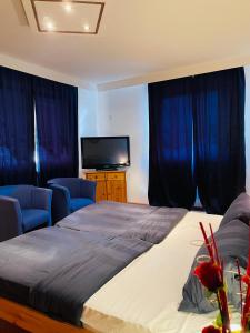 Postel nebo postele na pokoji v ubytování Hotel Ochsen