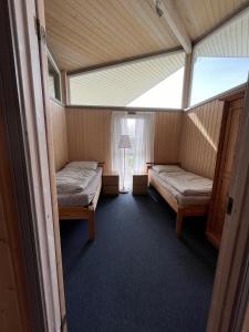 Postel nebo postele na pokoji v ubytování Feriendorf Klosterheide