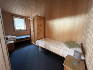 Postel nebo postele na pokoji v ubytování Feriendorf Klosterheide