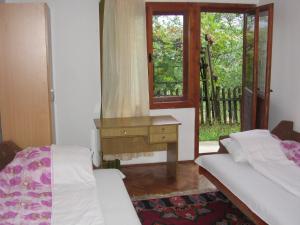 Postel nebo postele na pokoji v ubytování Guest house Pribojska Banja