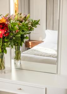A bed or beds in a room at Bella Venezia