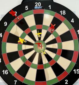 a dart board with arrows in the middle of it at A unique spacious 2-Bed Apartment in North London in London