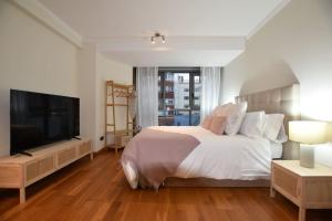 Postel nebo postele na pokoji v ubytování Apartamento pleno centro de Vigo