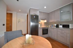 Kuchyň nebo kuchyňský kout v ubytování Apartamento pleno centro de Vigo