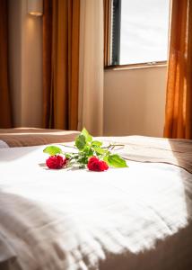 A bed or beds in a room at Bella Venezia