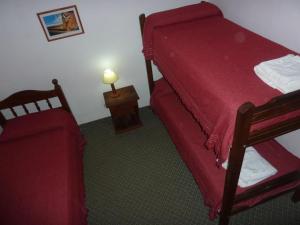 Krevet ili kreveti u jedinici u objektu Hotel Dos Reyes