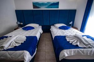 Postel nebo postele na pokoji v ubytování Hotel Play