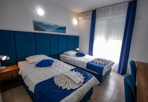Postel nebo postele na pokoji v ubytování Hotel Play