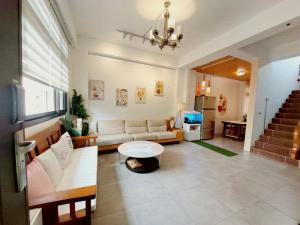 Area soggiorno di Field Trail Homestay