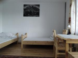 Postel nebo postele na pokoji v ubytování Trzech Koron 16