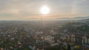 an aerial view of a city at sunset at Casa Mureșan in Braşov