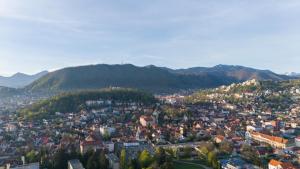 an aerial view of a town in the mountains at Casa Mureșan in Braşov