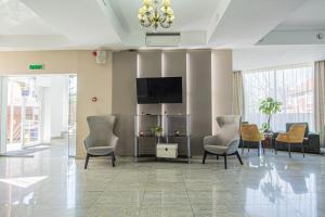 TV a/nebo společenská místnost v ubytování Casa Mureșan + 37 fotografií