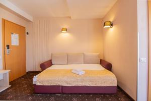 Postel nebo postele na pokoji v ubytování Casa Mureșan