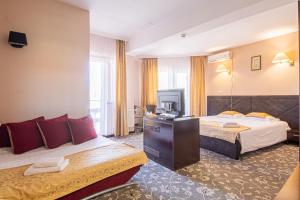 Postel nebo postele na pokoji v ubytování Casa Mureșan