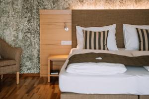 Hotel Auszeit St Lambrecht客房内的一张或多张床位