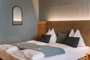 Hotel Auszeit St Lambrecht客房内的一张或多张床位