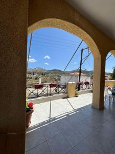 a view of a balcony with a view of the mountains at Christina's house in Kipséli