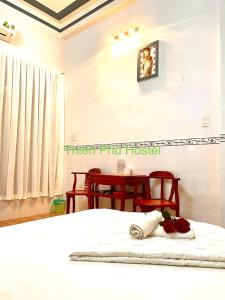 Katil atau katil-katil dalam bilik di Nhà nghỉ Thiên Phú