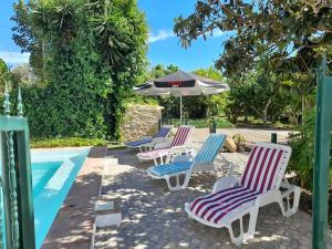 The swimming pool at or close to Quinta do Pomarinho with private pool