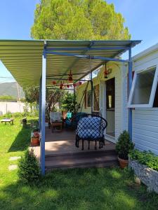 a pergola on a porch of a house at Villa Ardilla (La Adrada) in La Adrada