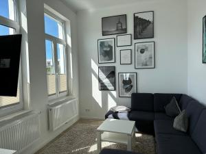 Posezení v ubytování WoogeElisa - Ehrwürdige Dorfvilla in Strandnähe
