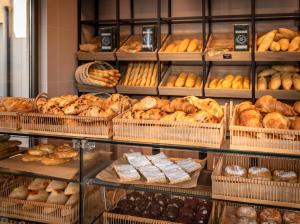 a bakery filled with lots of different types of bread at Maistra Camping Porto Sole Pitches in Vrsar