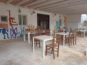 Reštaurácia alebo iné gastronomické zariadenie v ubytovaní La casa degli artisti