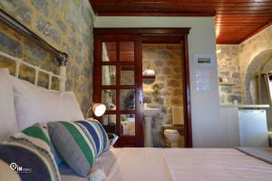 Letto o letti in una camera di 'Panorama' Stone House On The Beach