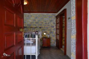 Letto o letti in una camera di 'Panorama' Stone House On The Beach