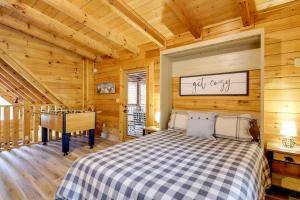 a bedroom with a bed and a piano in a room at Pigeon Forge Vacation Rental with Private Hot Tub! in Pigeon Forge