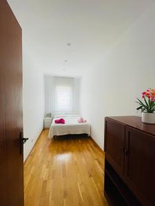 Ένα ή περισσότερα κρεβάτια σε δωμάτιο στο Room barcelona