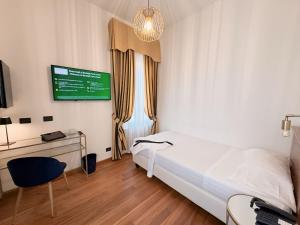 TV a/nebo společenská místnost v ubytování Rechigi Park Hotel