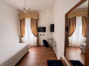 Postel nebo postele na pokoji v ubytování Rechigi Park Hotel