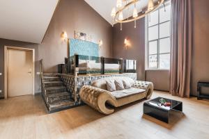 a living room with a bunk bed and a couch at Penthouse Suite Rome - Private Suites in Rome