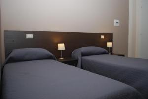 A bed or beds in a room at B&B Grandangolo