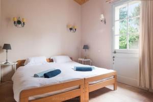 En eller flere senge i et værelse på Le Marais Aixois - Grande maison familiale