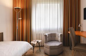 Postel nebo postele na pokoji v ubytování Hotel Astra