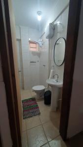 A bathroom at Quintal da Canastra - Room