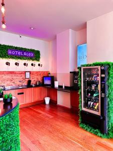 a hotel alley with a refrigerator in a restaurant at Hotel Alex Berlin in Berlin