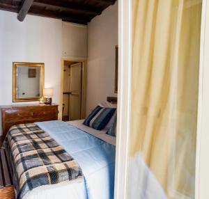 Posteľ alebo postele v izbe v ubytovaní Trevi fountain apartment