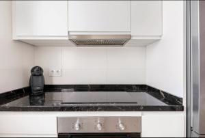 A kitchen or kitchenette at Acogedor y precioso apartamento en Sevilla