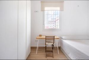 A bed or beds in a room at Acogedor y precioso apartamento en Sevilla