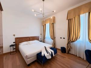 Postel nebo postele na pokoji v ubytování Rechigi Park Hotel + 37 fotografií