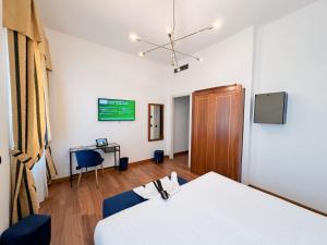 TV a/nebo společenská místnost v ubytování Rechigi Park Hotel