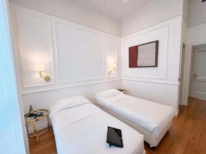 Postel nebo postele na pokoji v ubytování Rechigi Park Hotel