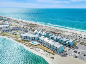 an aerial view of a resort on the beach at Palm Beach Club 125 in Pensacola Beach