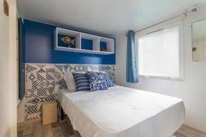 Postel nebo postele na pokoji v ubytování Maïana Resort + 36 fotografií
