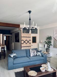 Posezení v ubytování L'Haussmanien au Coeur de ville